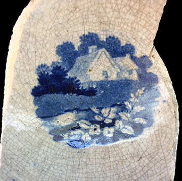 Pearlware Canova shape handled cup printed underglaze in medium blue. One of two matching cups from this assemblage. 3.5” rim diameter; 2.25” vessel height. Middle image is cup interior. Image on bottom, a plate, whose pattern is called "The Footbride," is from a private collection.